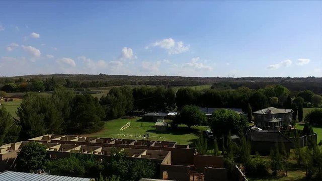 Aerial view of Construction site in the late summer time, bare bones of a resort.