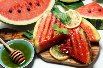 Ripe Healthy Organic Grilled Watermelon with Honey. © beats_