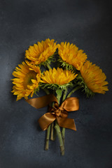 Sunflower bunch on gray 