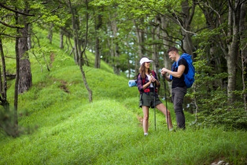 Fototapeta premium Loving couple on their hiking trip