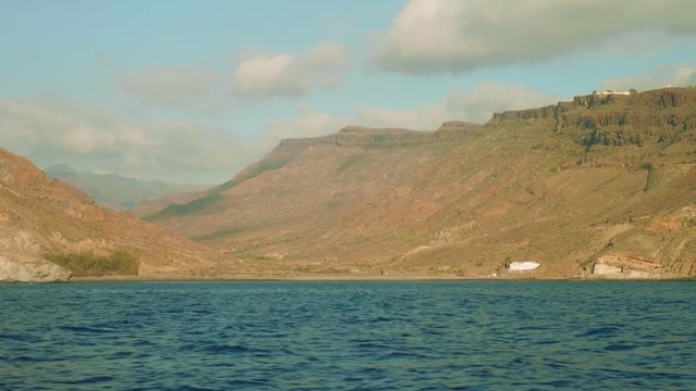 Opening view of ricky clove of Gran Canaria island. View from sailing yacht