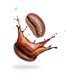 Coffee beans with splashes close-up on white background