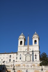 Fototapeta na wymiar View to Church Santissima Trinità dei Monti at Spanish stairs in Rome, Italy 