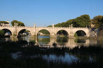 Fototapeta na wymiar Angel Bridge over the Tiber River in Rome, Italy 