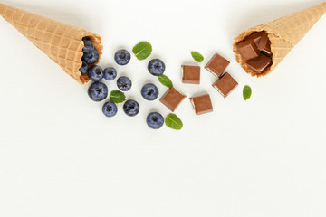 chocolate, blueberry in a waffle cone for ice cream