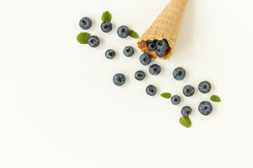 fresh blueberries in a waffle cone for ice cream