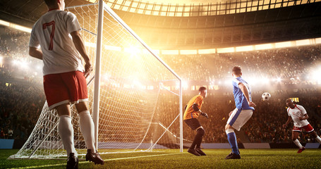 Intense soccer moment in front of the goal on the professional soccer stadium.