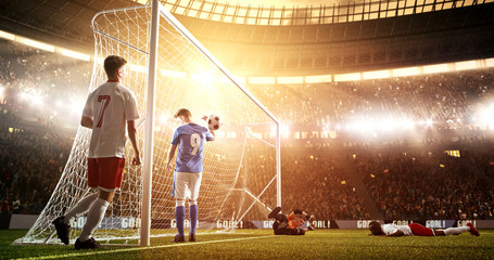 Intense soccer moment in front of the goal on the professional soccer stadium.