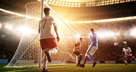 Intense soccer moment in front of the goal on the professional soccer stadium.