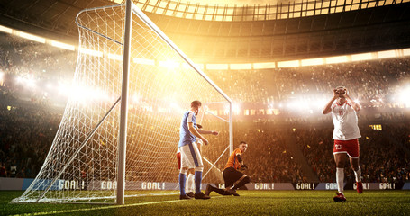Intense soccer moment in front of the goal on the professional soccer stadium.