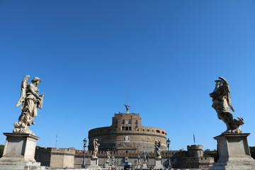 Obraz premium Mausoleo di Adriano and Angel Bridge on the Tiber River in Rome, Italy 