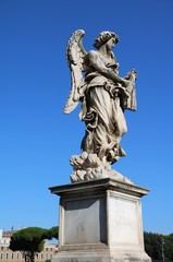 Fototapeta na wymiar Sculptures at Angel Bridge at Mausoleo di Adriano in Rome, Italy 