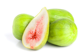 Ripe green fig fruit and half isolated on white background