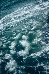 Fototapeta na wymiar Deep blue-green abstract sea water background