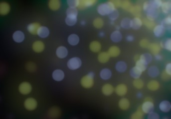 Obraz premium Big colorful defocused lights on dark background.