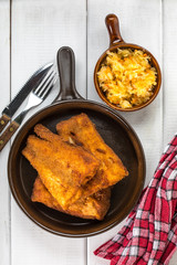 Pieces of cod in breadcrumbs.