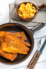 Pieces of cod in breadcrumbs.