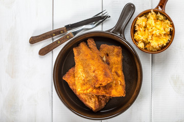 Pieces of cod in breadcrumbs.