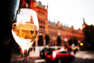 London city reflection in wineglass