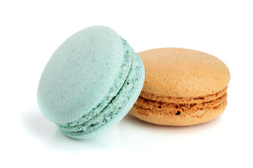 orange and blue macaroon isolated on white background closeup