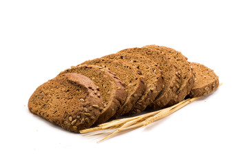 Freshly baked rye bread, whole grain food with a lot of fiber isolated on a white background