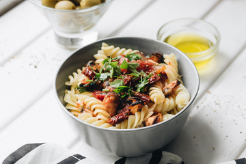 Delicious pasta with tomatoes, mussels and herbs