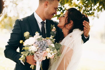 Sensual portrait of a young couple. Wedding photo outdoor