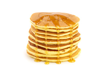 Pancakes stack with honey isolated on white background closeup