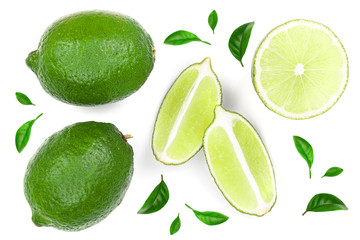 sliced lime with leaves isolated on white background. Top view. Flat lay pattern