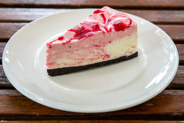 Strawberry milk cake on table