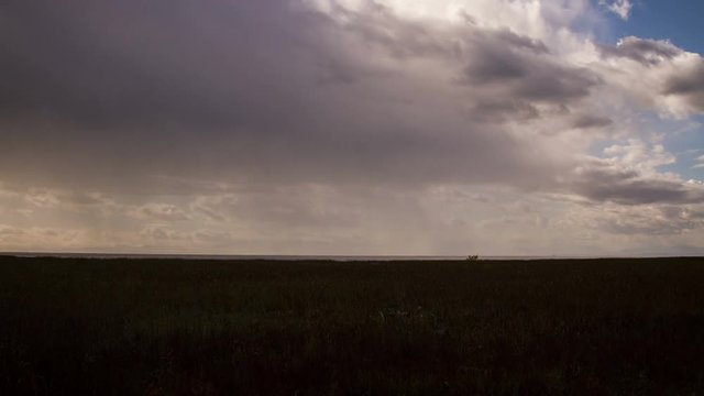 time lapse of heavy rain in the distance