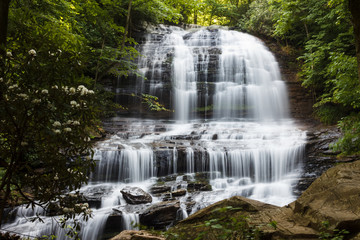 Beautiful high waterfall among the forest in summer. Waterfall and Botanical Preserve Pearson's Falls, Saluda, NC, USA