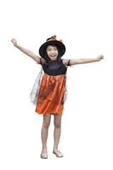 Portrait of asian girl in witch costume and hat standing