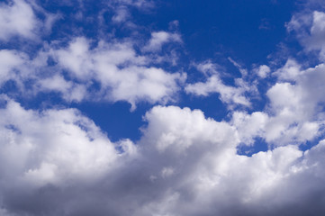 blue sky with white and gray clouds; cumulus. background; nature