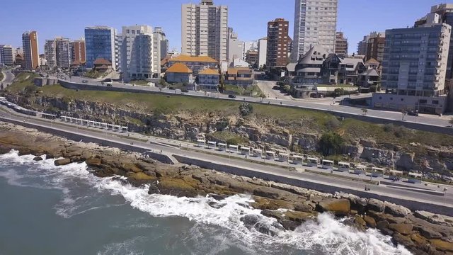 Torreon del Monje coast of Mar del Plata Argentina – 4k drone video of the Argentinian coast and downtown area of Mar del Plata Casino Central in spring time.  Buenos Aires Capital Federal district  