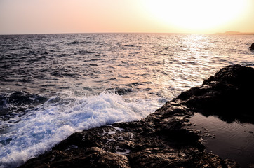 Strong Waves Crashing on the Volcanic Coast
