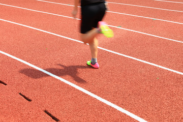 Fototapeta premium Athletes running in the playground