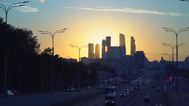 view of the skyscrapers and towers of downtown at sunset