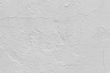cracked concrete wall covered with gray cement background.