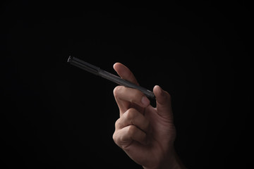 hand of businessman emotion on black background