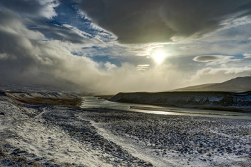 Winter in the mountains. Christmas landscape on a sunny morning.