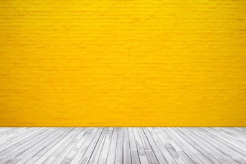 Yellow brick wall texture with wood floor background