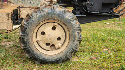 Fototapeta na wymiar Wheeled tractor is on site