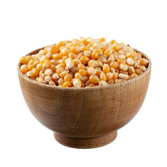 Corn seeds in a wooden bowl isolated on a white background
