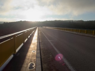 Fototapeta premium czech countryside road in a morning mist