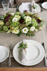 Neatly twisted into a tube dining room napkin decorated with a sprig of pistachio. Wedding Banquet...