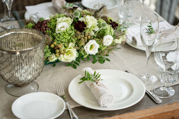 Wedding Banquet or gala dinner. The chairs and table for guests, served with cutlery and crockery....