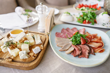 Different meals for the guests on Banquet table. delicious dishes on the table in the restaurant. serving table for birthday or wedding.