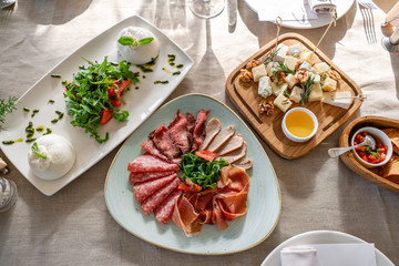 Different meals for the guests on Banquet table. delicious dishes on the table in the restaurant. serving table for birthday or wedding.