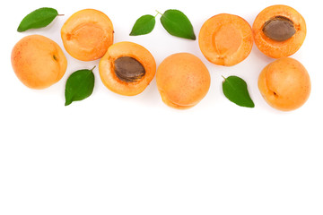 Apricot fruits with leaves isolated on white background with copy space for your text. Top view. Flat lay pattern